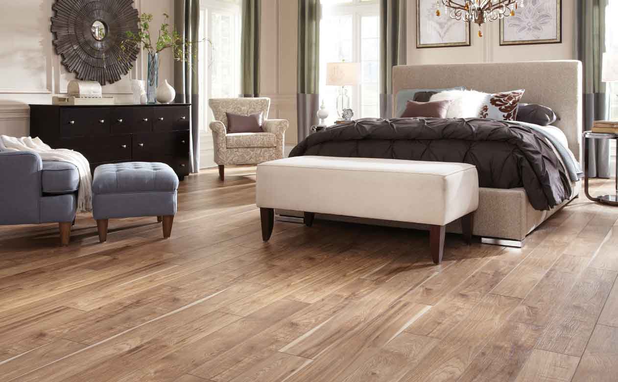 Wood-look tile floor with blue chair and black table